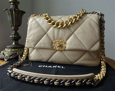 chanel lambskin cream flap bag